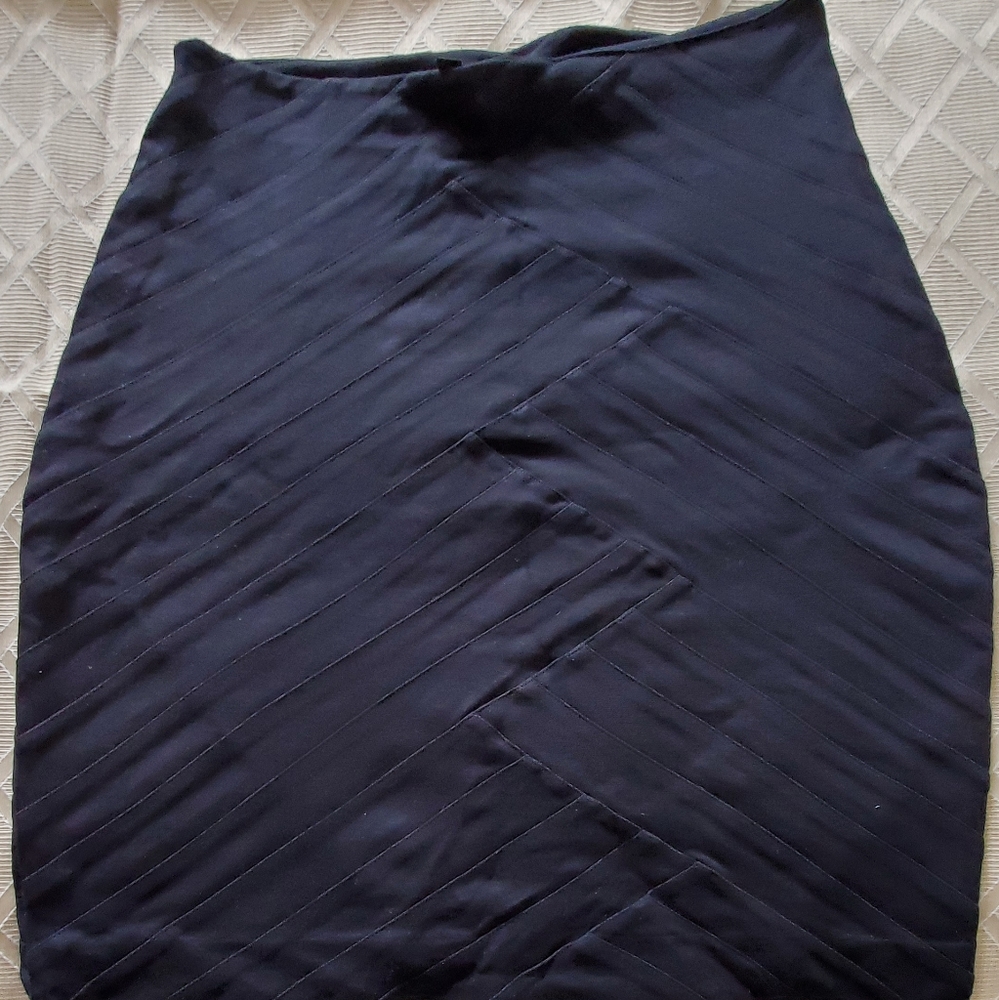 New 2  Express mini  pull on skirts hit above knee.